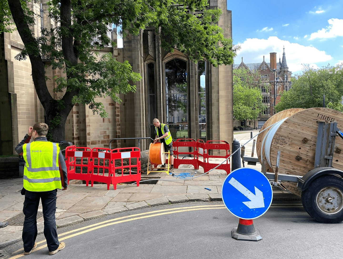 Pine Media engineer installing fibre subduct to a building